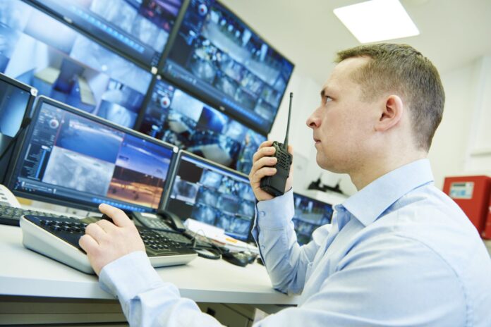 Surveillance security system. Video monitoring woker