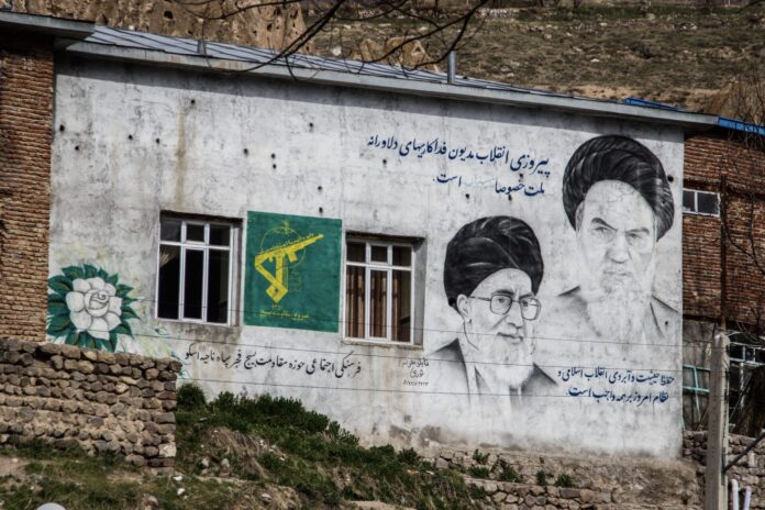 Portraits of the presidents of Iran on the wall. Khomeini