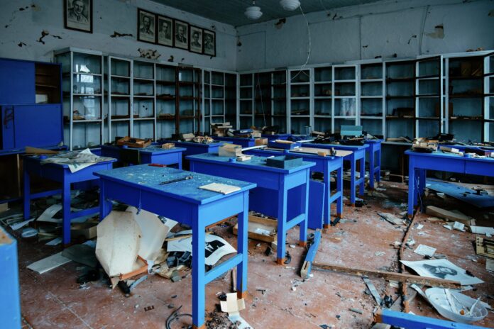 Ruined classroom in abandoned school